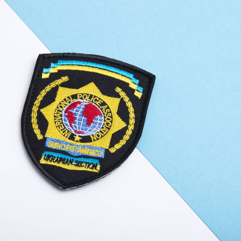 Шеврон на липучці International Police Association 7х9 см вишитий патч нашивка